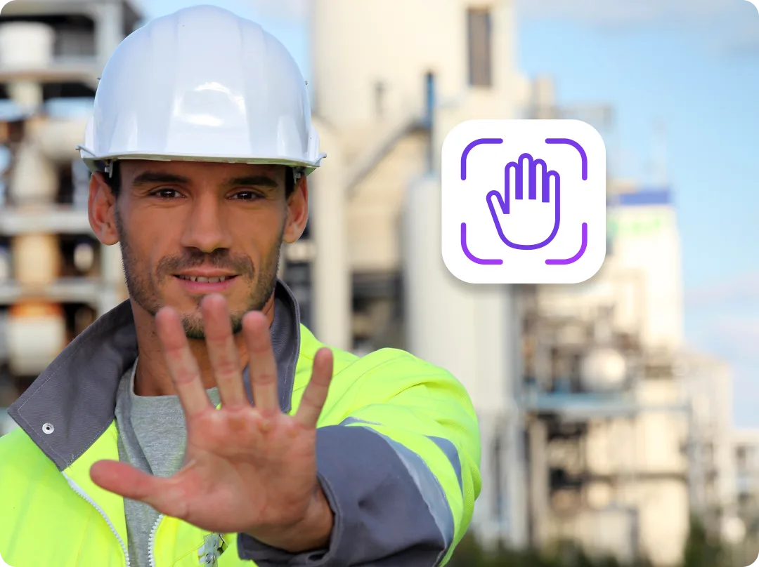 Worker holding a palm up to the EasyClocking P3000 touchless palm recognition time clock