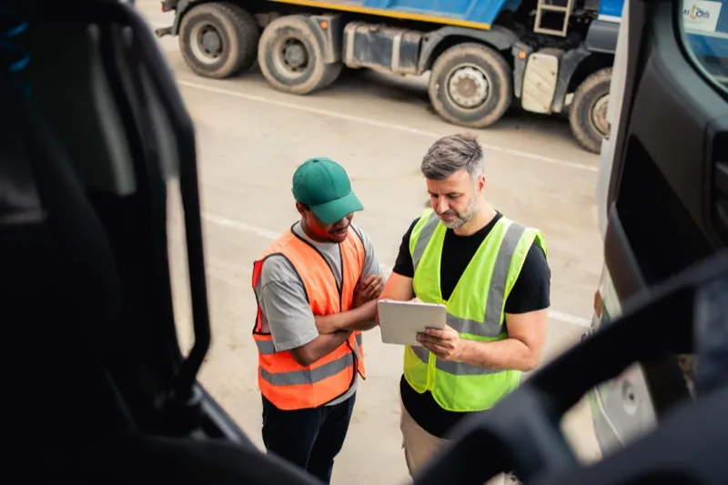Fleet drivers at a logistics yard — transportation time tracking